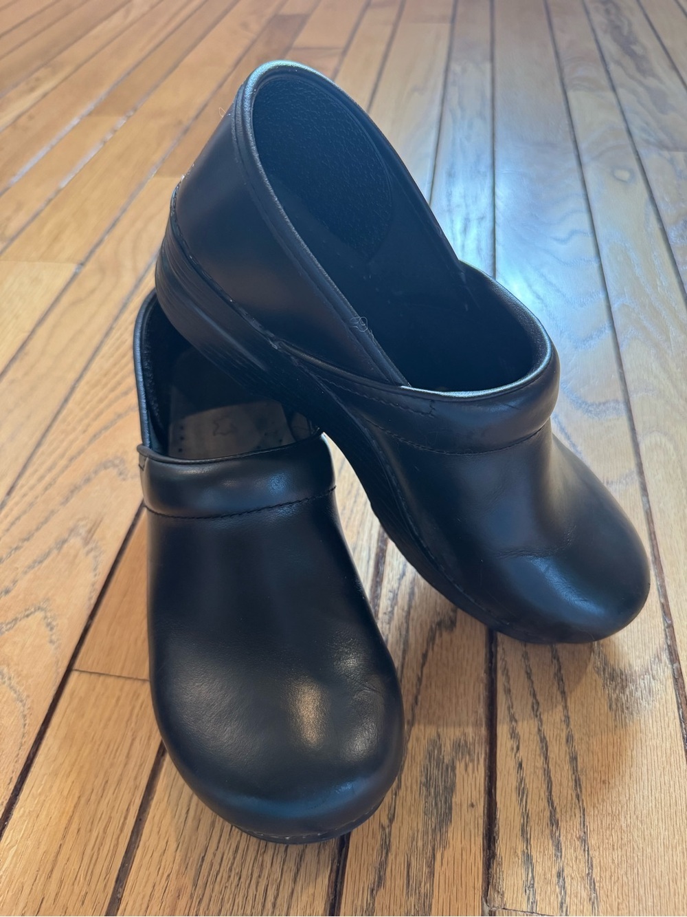 Dansko Black Leather Slip-On Clogs for Women